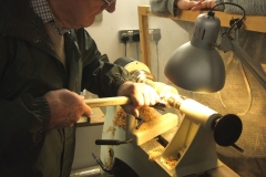 Here Bob is cleaning up the base of his Christmas tree prior to taking it off the lathe.