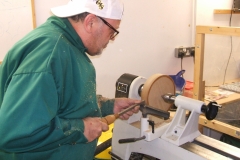 This is Colin MacKenzie making a start on his Elm platter, Colin works a lot with tipped tools.