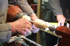 A little bit of sanding taking place before Errol would part it free from the lathe.