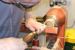 Here Mark is using a ring tool on the inside to give him the shape and quality of cut on the inside.