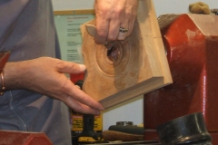 Mark applying some size to the centre to hold the metal leaf.