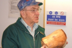 Here I am showing the crowd my intended work piece, a piece of spalted beech that will be a natural edged bowl.
