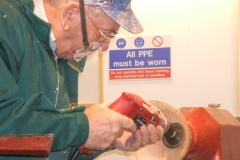 Sanding of the inside using the Powerlock system, both the lathe and the drill running.