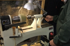 Bob is now working on his 2nd project the candle holder, here he can be seen drilling the hole for the candle.
