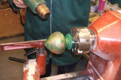 The 3rd of my bourballs, this one had a coat of glitter sprayed over the green base coat, here I'm assisting the drying with a heat gun.