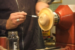 Here Andy is applying a coat of sanding sealer.