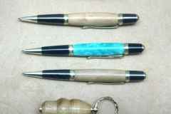 Some of David McGruers finished pens along with a small key ring.