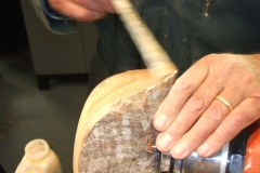 Mark Dale applying sanding sealer to his natural edged bowl.