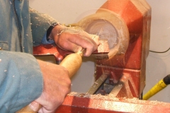 Mark Dale working on the inside of his natural edged bowl.