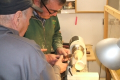 Here Dave line is being supervised on the use of a parting tool to cut the goblet free, Bill Munro is ready to assist if needed.