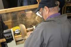 Bill Munro working the outside of his Bird Cherry bowl.