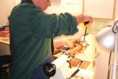Here we have David Hobson mounting a piece of Mahogany in the chuck to make some finials.