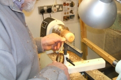 This is Douglas Stewart making a start on one of his 2 fruits, this is an Apple being made from a piece of Yew wood.