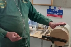 Here we have John Ruickbie as he sets up to start his turned clock. John was to make a clock using a chapter ring.