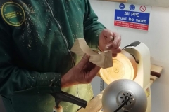 John uses a small saddle  for the base of his clock , here he can be seen explaining how it works.