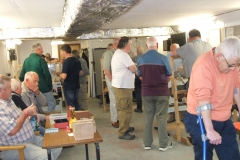 The inside of the club house, with the members watching their preferred turner.