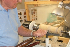 Bob Chisholm now making a Butternut Squash from a piece of fence post.