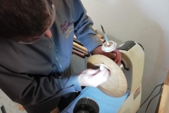 Here David is applying a coat of sanding sealer to the inside of his platter.