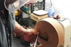 Here Richard is working the outside of his Elm platter.