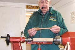Here John is showing one of the main components, a threaded part that he was now going to demonstrate how it was made.