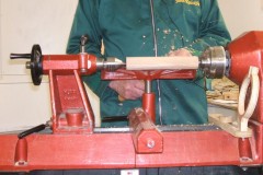 He started with a length of squared Beech and turned it into a cylinder, the speed was about 1200 rpm initially going up to about 1500 rpm .