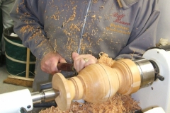Bill Munro working on the shape of his base with a large gouge.