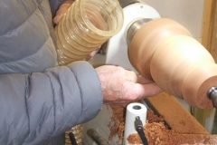 Bob getting to the end of his shaping, now doing a little sanding.