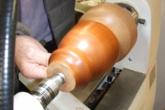 Here Bob Chisholm is sealing and polishing his lamp base.