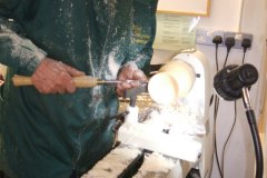 Now Nick is working the outside of the goblet, forming the cup shape and the stem.