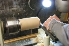 David starts to shape the blank to take a plastic seal that fits the top of a jam jar.