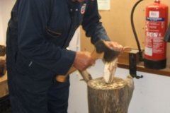 Here we have Mark Dale making his first cuts on a piece of Birch using a hatchet and a home made chopping block. Mark would go on to make a large spoon or ladle.