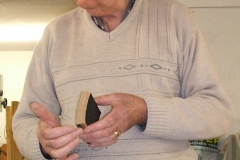 Here John is showing the members part of one of the staves as he got them and described what he had to do.