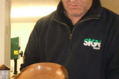 Here we have David Hutcheson showing on of his entries, a shallow natural edged bowl in Elm.