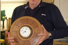 Bill altered the plate and with the inclusion of a ring of Walnut and a clock movement, he turned the plate into a wall clock.