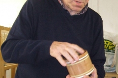 A small wooden box made from Beech with Milliput bands and an inserted top.