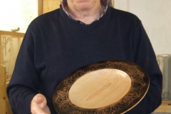 Last of my entries, a shallow plate in Beech with a Laser design rim and scorched finish.