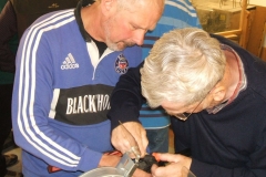 Alec Mutch preparing his equipment to start the sharpening demonstration.