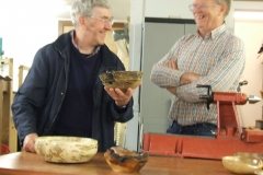 This picture shows the piece that came out of the bowl using the bowl saver with the bowl to the left and the natural edged bowl to the right.