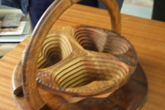 The plate after the handle had been raised turned this flat piece of work into a 3 compartment bowl,